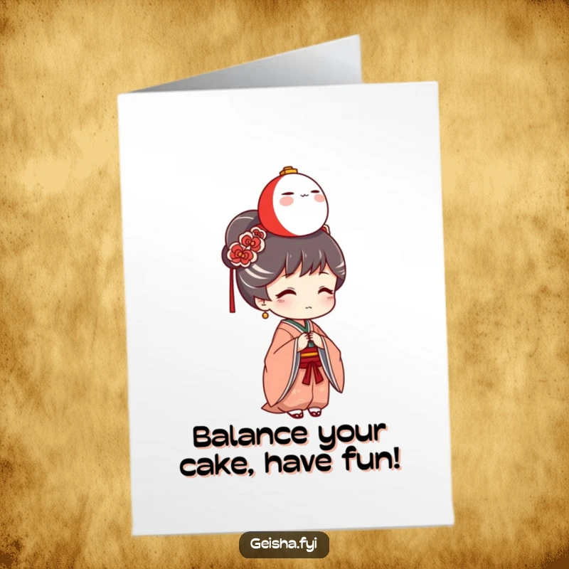 Funny Free Printable Geisha Birthday Card with a Daruma doll precariously balanced on her head, spreading joy.