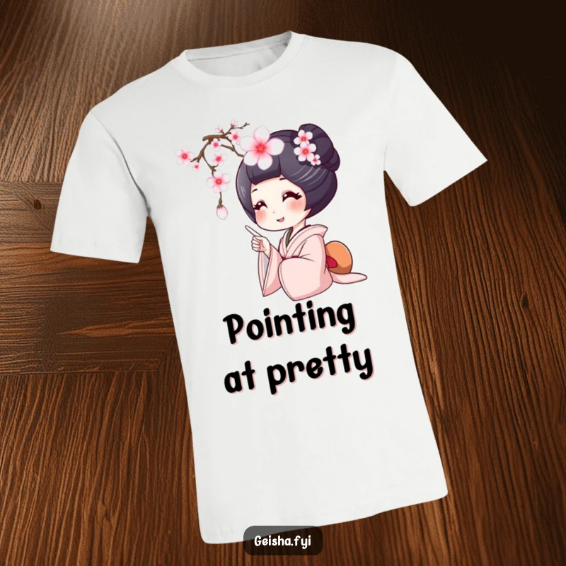 Funny geisha t-shirt, a geisha smiles widely while pointing at a falling cherry blossom, capturing a moment of pure joy.